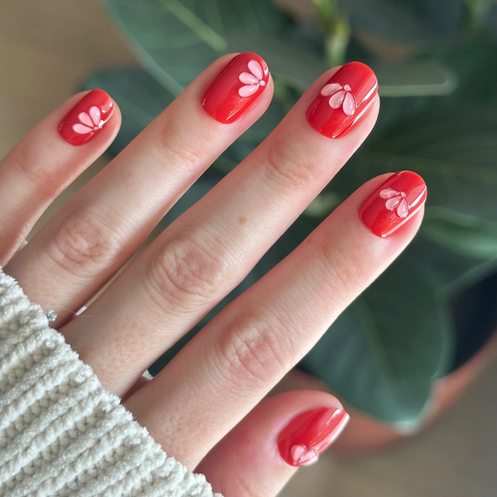 Puffy Pink Petals - Press-On | Extra Short | Round deep red nails with raised soft pink petal accents for at-home mani