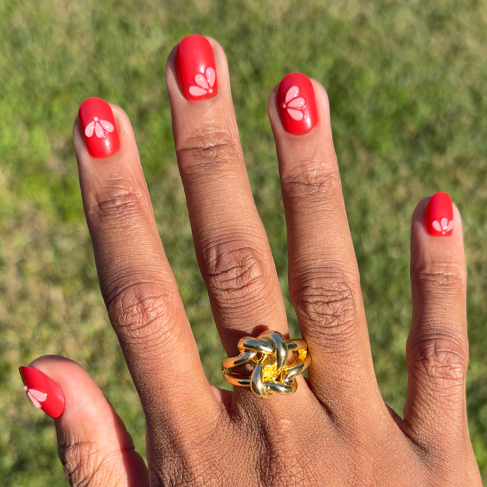 Puffy Pink Petals - Press-On | Extra Short | Round nails in bright red with subtle 3D petal details for easy at-home mani