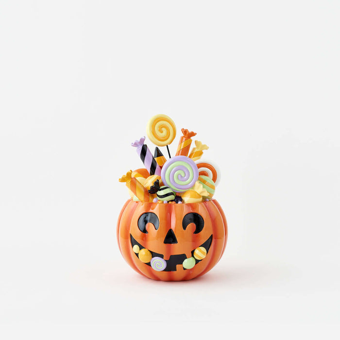 Pumpkin Candy Display featuring a resin Jack-o'-Lantern filled with colorful faux candies and lollipops.
