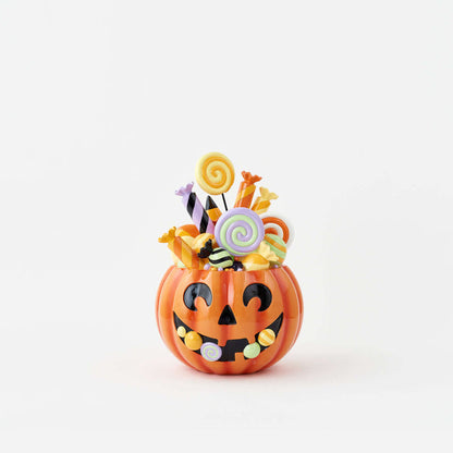 Pumpkin Candy Display featuring a resin Jack-o'-Lantern filled with colorful faux candies and lollipops.
