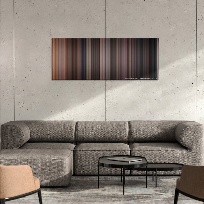 Rear Window color palette canvas on a concrete wall above a gray sectional sofa