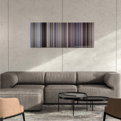 RoboCop color palette canvas on a concrete wall above a gray sectional sofa