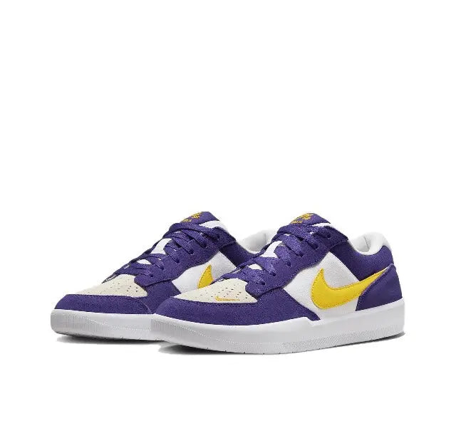 Pair of purple low-top sneakers with white panels and yellow swoosh