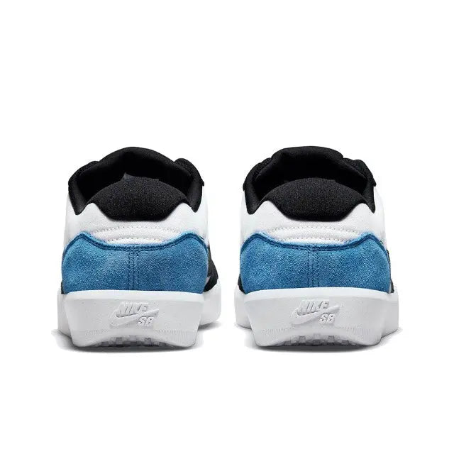 Black and blue heel and collar view of a low-top skate sneaker with white panels.