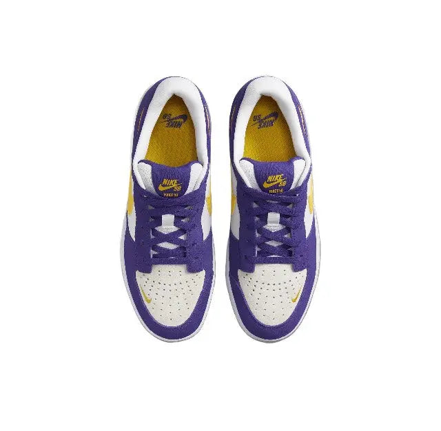 Purple and white low-top sneakers with yellow interior lining