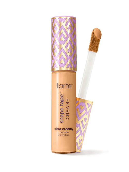 Tarte Shape Tape Creamy concealer with applicator on a white background