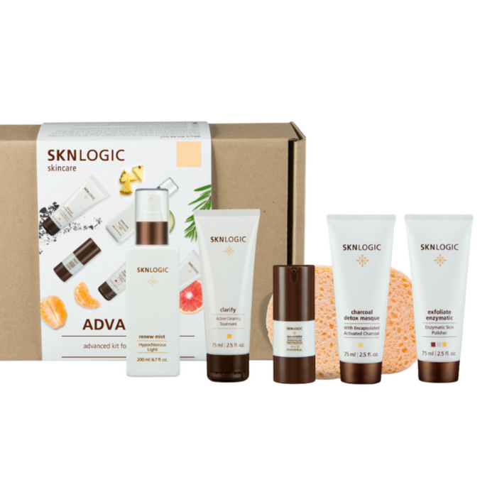 SKNKIT009 SKNLOGIC Clearer Skin Retail Kit | SKNLOGIC skincare products including bottles and a box on a white background