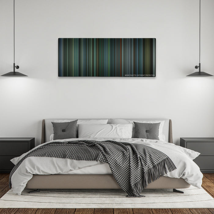 Snatch color palette canvas above a bed, between two black pendant lamps