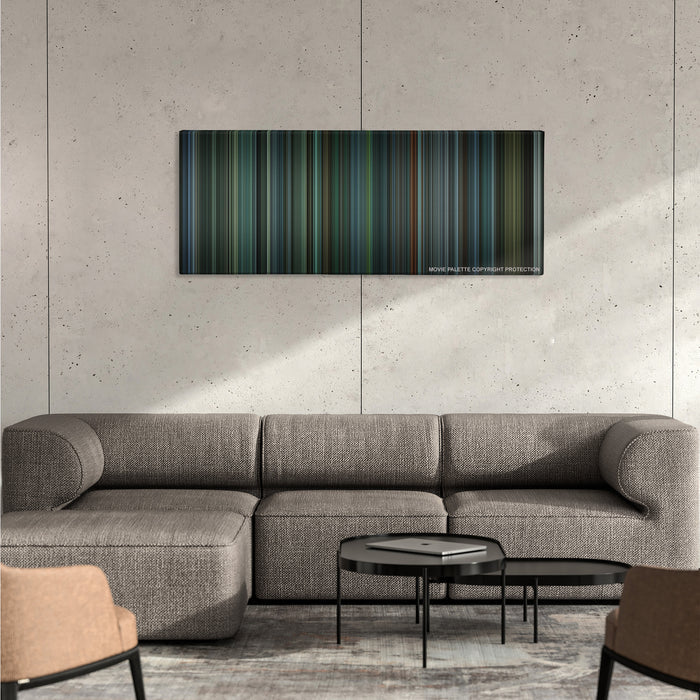 Snatch color palette canvas on a concrete wall above a gray sectional sofa