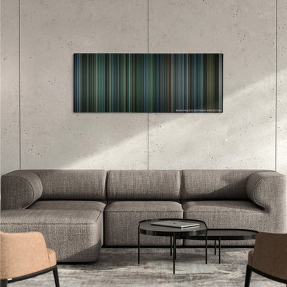 Snatch color palette canvas on a concrete wall above a gray sectional sofa