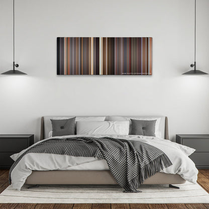 Spaceballs color palette canvas above a bed, between two black pendant lamps