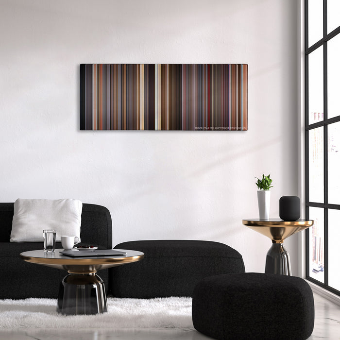 Spaceballs color palette canvas above a black sofa with a gold-topped table