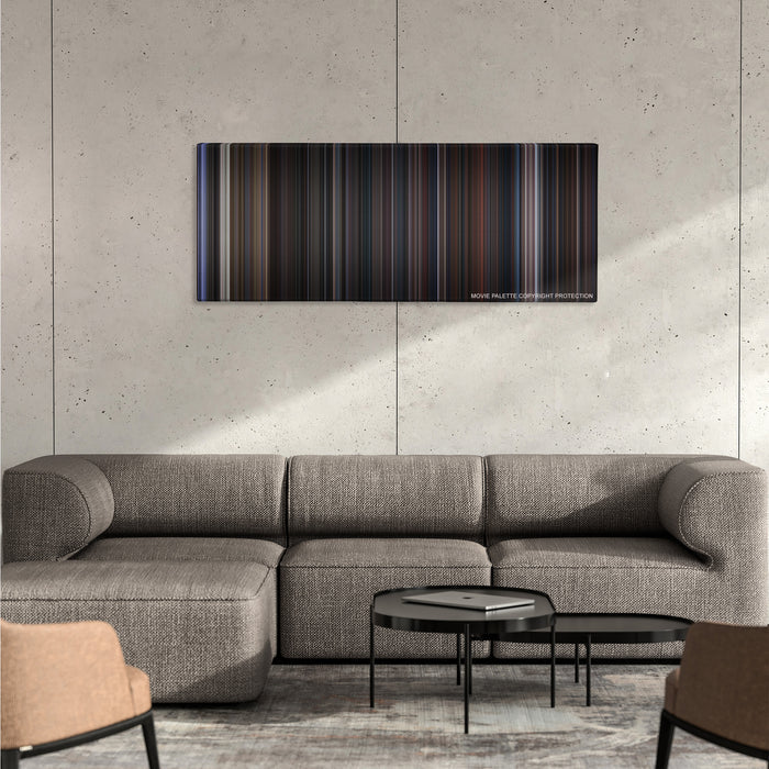 The Addams Family color palette canvas on a concrete wall above a gray sectional sofa