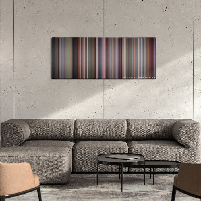 The Full Monty color palette canvas on a concrete wall above a gray sectional sofa