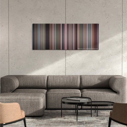 The Full Monty color palette canvas on a concrete wall above a gray sectional sofa