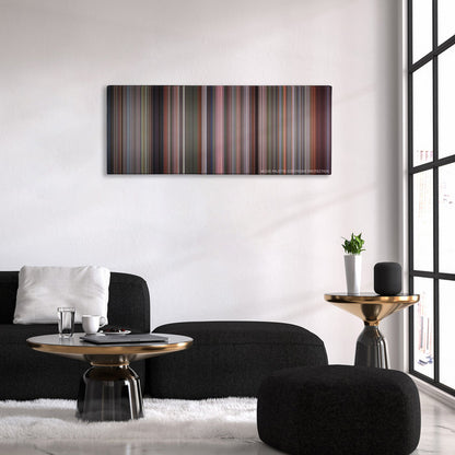 The Full Monty color palette canvas above a black sofa with a gold-topped table