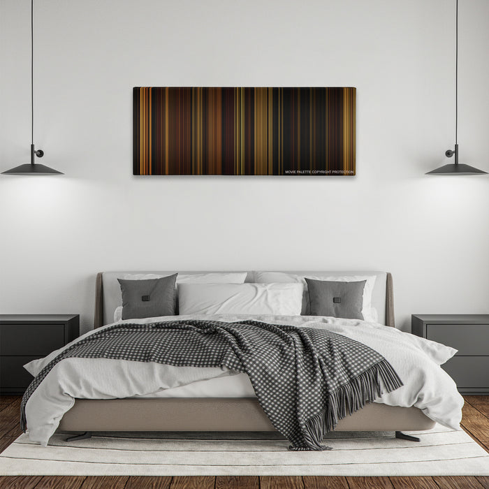 The Illusionist color palette canvas above a bed, between two black pendant lamps