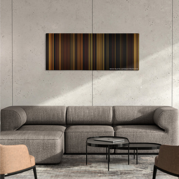 The Illusionist color palette canvas on a concrete wall above a gray sectional sofa