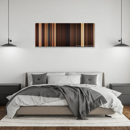 The Mummy color palette canvas above a bed, between two black pendant lamps