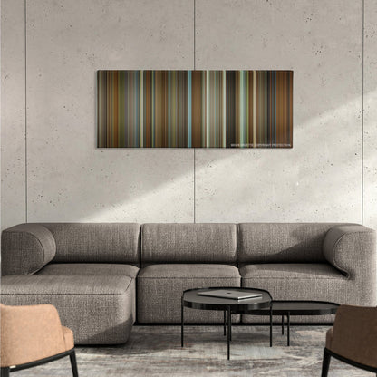 The Princess Diaries color palette canvas on a concrete wall above a gray sectional sofa