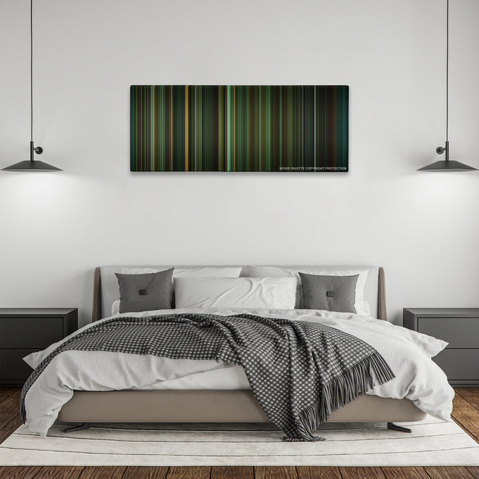 The Shape of Water color palette canvas above a bed, between two black pendant lamps