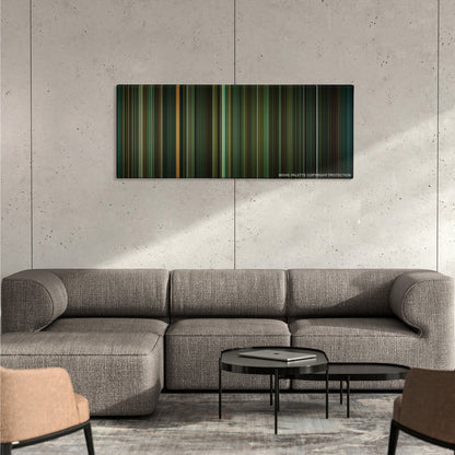 The Shape of Water color palette canvas on a concrete wall above a gray sectional sofa