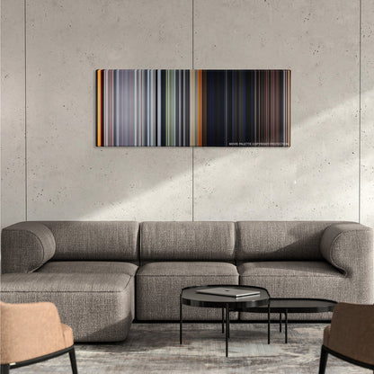 The Texas Chain Saw Massacre color palette canvas on a concrete wall above a gray sectional sofa