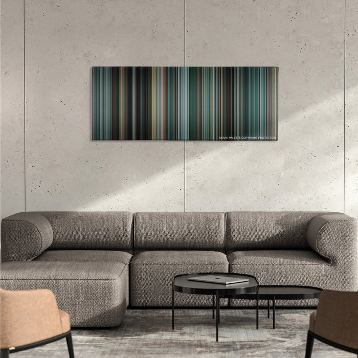 The Town color palette canvas on a concrete wall above a gray sectional sofa