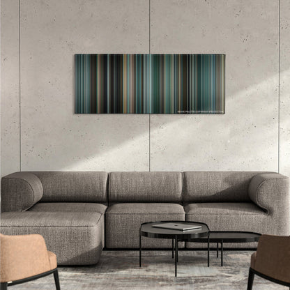 The Town color palette canvas on a concrete wall above a gray sectional sofa