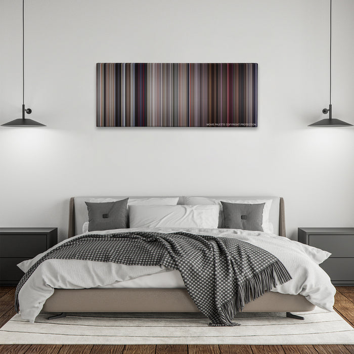 They Live color palette canvas above a bed, between two black pendant lamps