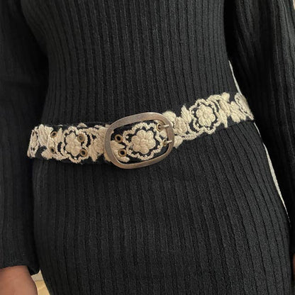 Black dress with floral embroidered belt