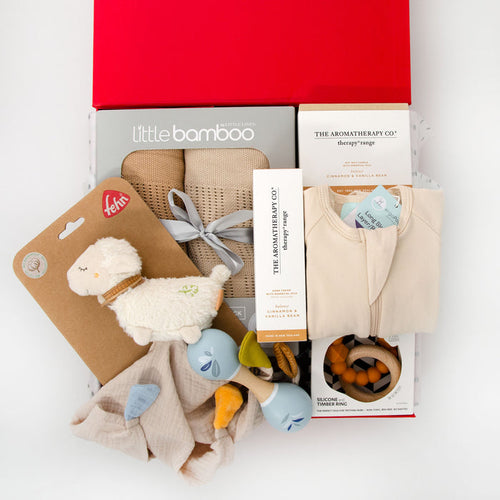 Includes a warm toned Bamboo Cellular Blanket Set containing two super soft, lightweight blankets. An ergoPouch romper, a Speedy Monkey Wooden Maraca, Jellystone Moon Teething Ring and cute Fehn muslin comfort toy. For mum, a Cinnamon & Vanilla scented candle and matching hand cream. Price: $230