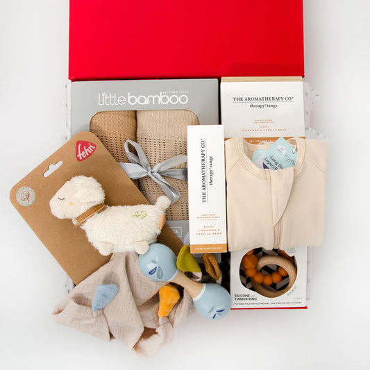 Includes a warm toned Bamboo Cellular Blanket Set containing two super soft, lightweight blankets. An ergoPouch romper, a Speedy Monkey Wooden Maraca, Jellystone Moon Teething Ring and cute Fehn muslin comfort toy. For mum, a Cinnamon & Vanilla scented candle and matching hand cream. Price: $230