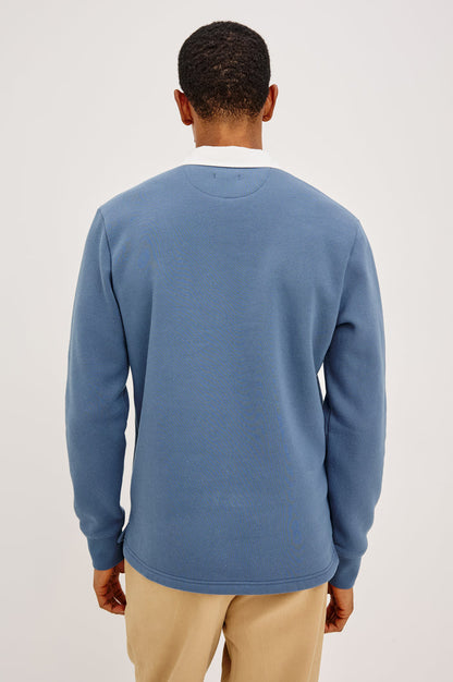 Wright Shirt in Midweight Fleece, Brushed Backing, Relaxed Fit, Vintage-Inspired Contrast Rugby Collar, Two-Button Placket, and Straight Hem With Side Slits in Vintage Steel Colorway - Upper Body Back View Featured on Model
