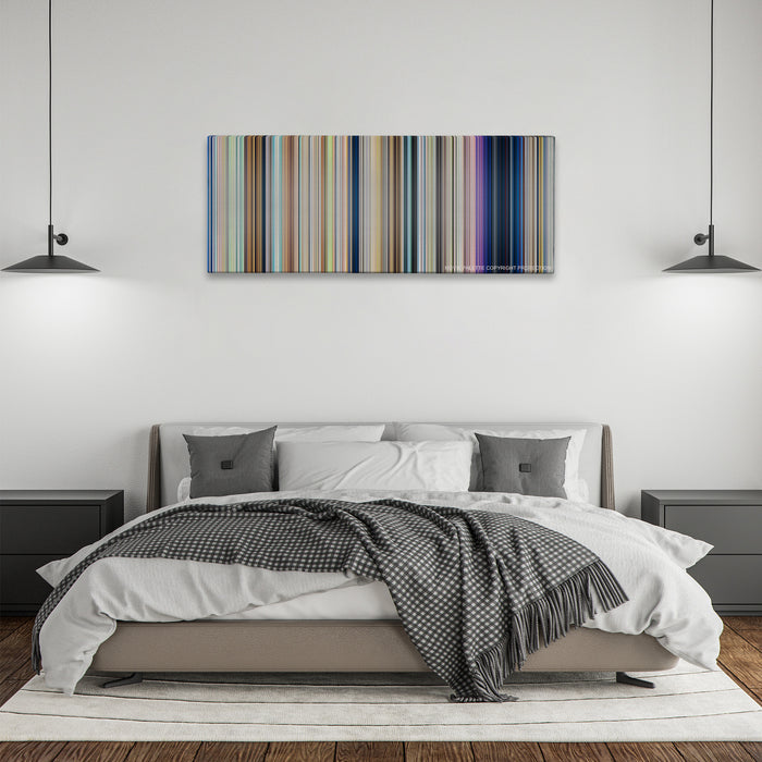 Your Name. color palette canvas above a bed, between two black pendant lamps